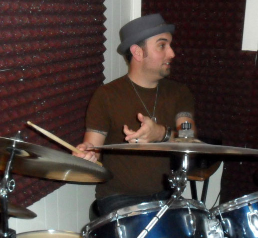 B.J. Capelli teaching how to set the beat.